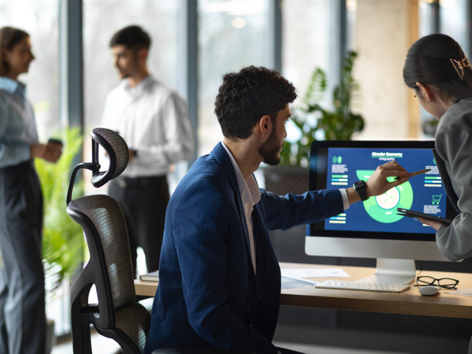 people office analyzing checking finance graphs scaled